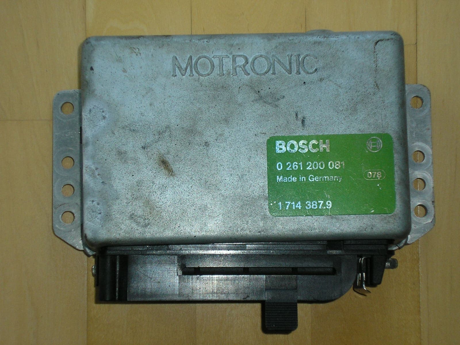 Automotive engine control unit (ECU) module, an example of automotive-grade electronics