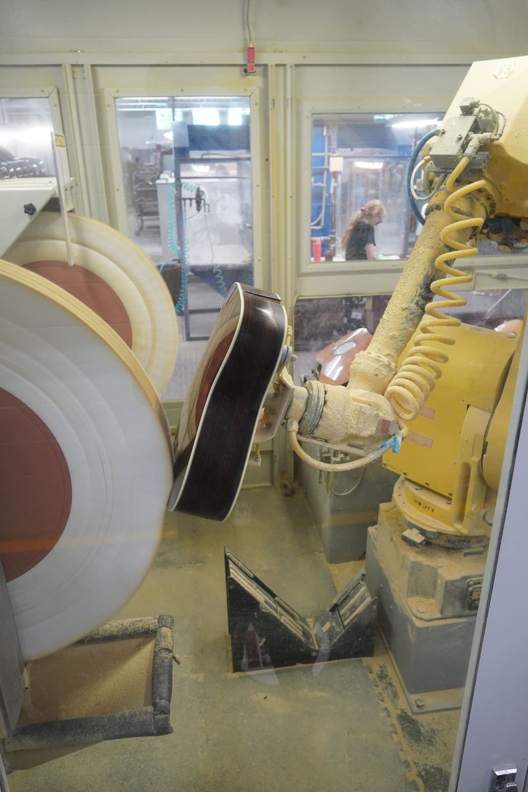Industrial robotic arm operating on a manufacturing line